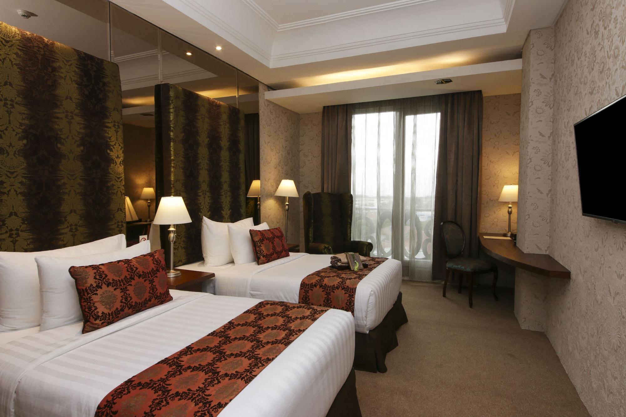 Cinnamon Hotel Boutique Syariah Tutugan Екстериор снимка