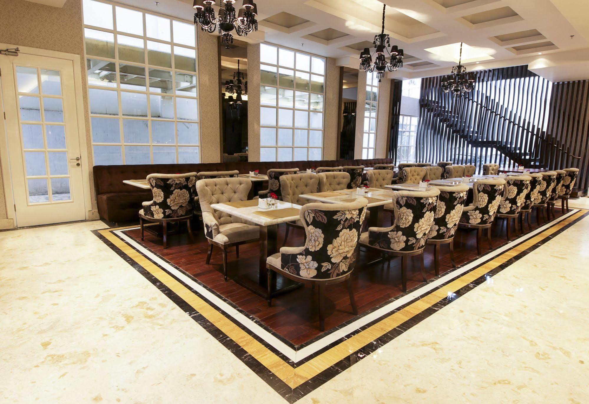 Cinnamon Hotel Boutique Syariah Tutugan Екстериор снимка