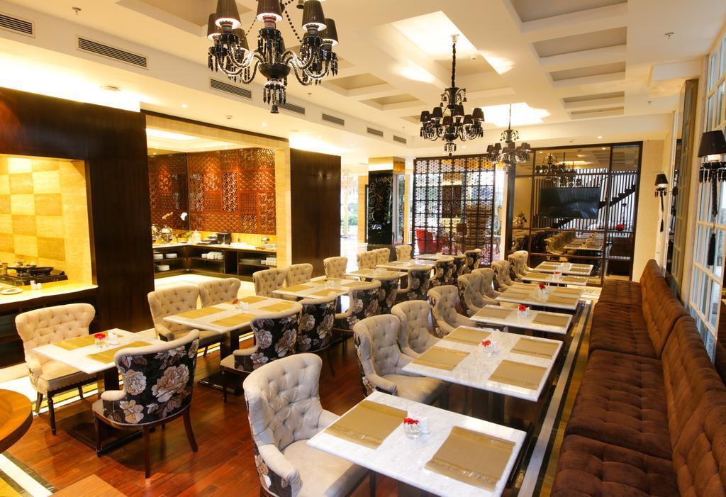 Cinnamon Hotel Boutique Syariah Tutugan Екстериор снимка